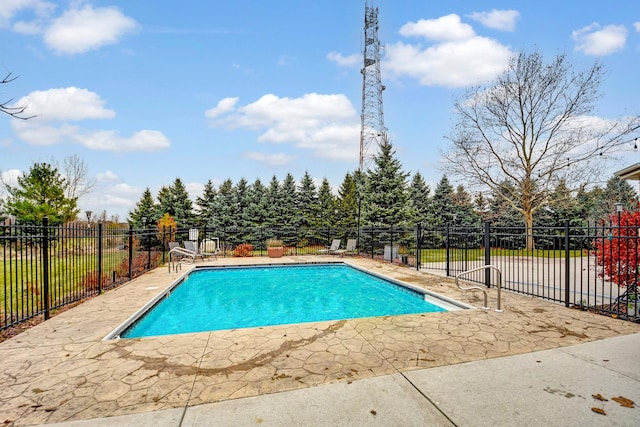 view of swimming pool with a fenced in pool, a patio area, and fence