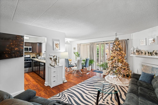 living room with dark hardwood / wood-style flooring