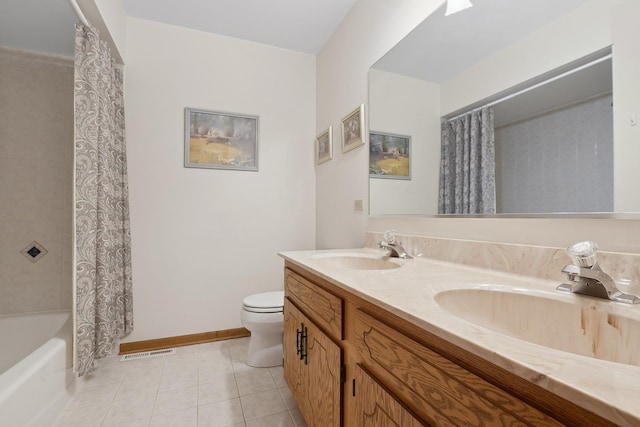 full bathroom featuring vanity, tile patterned floors, toilet, and shower / tub combo with curtain