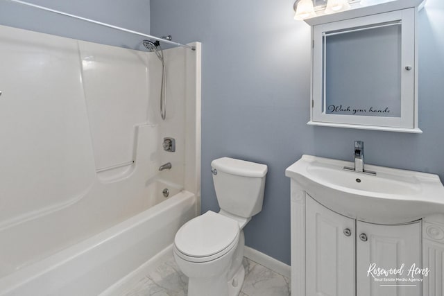 full bathroom featuring bathtub / shower combination, vanity, and toilet