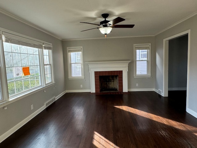 unfurnished living room featuring a fireplace, dark hardwood / wood-style flooring, ceiling fan, and ornamental molding