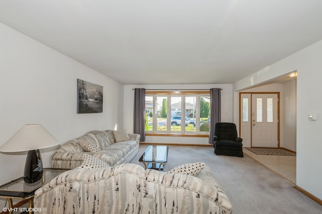 living room featuring light colored carpet