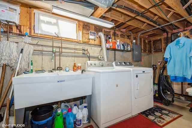 washroom with washer and dryer