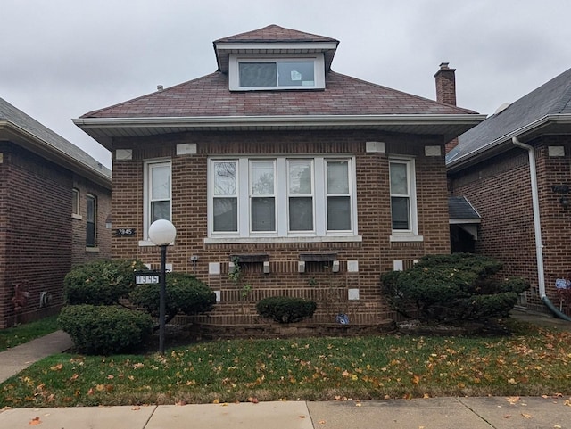 view of property exterior with a yard