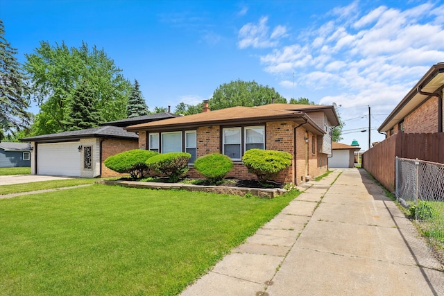 view of front of house with a front lawn and a garage