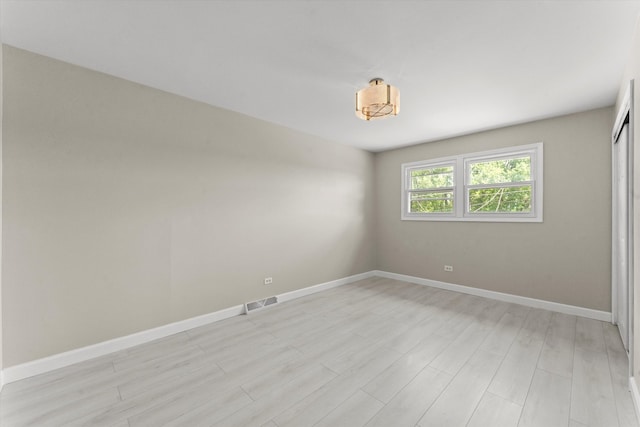 empty room featuring light wood-type flooring