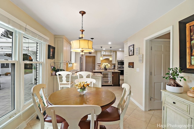 tiled dining area with beverage cooler