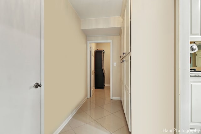 corridor with light tile patterned flooring