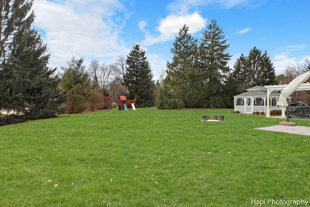 view of yard with a playground