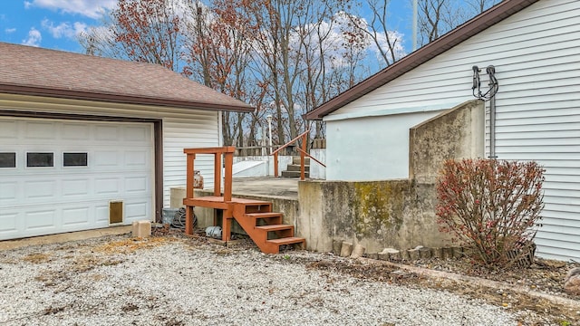 view of property exterior with a garage