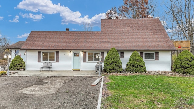 view of front of house with a front yard