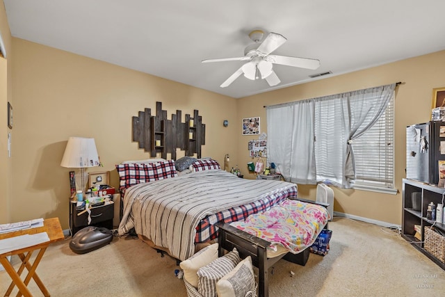 carpeted bedroom featuring ceiling fan