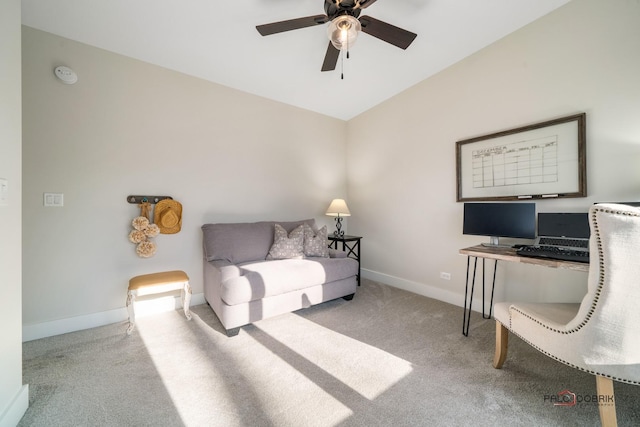 interior space with light carpet and ceiling fan