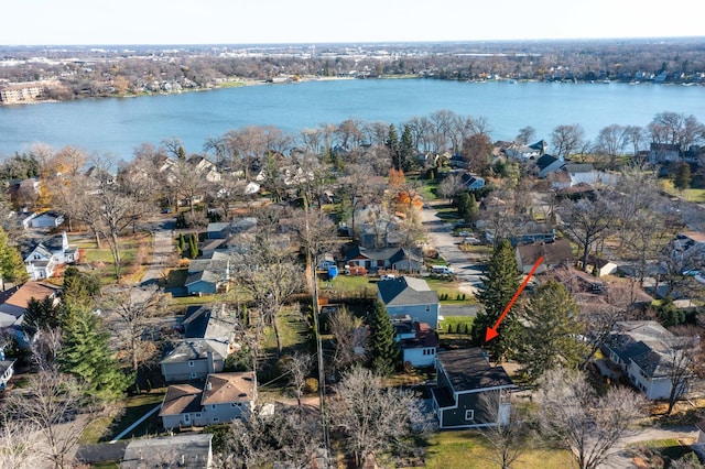 drone / aerial view with a water view