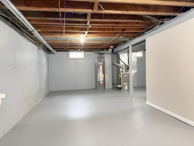 basement with heating unit and water heater