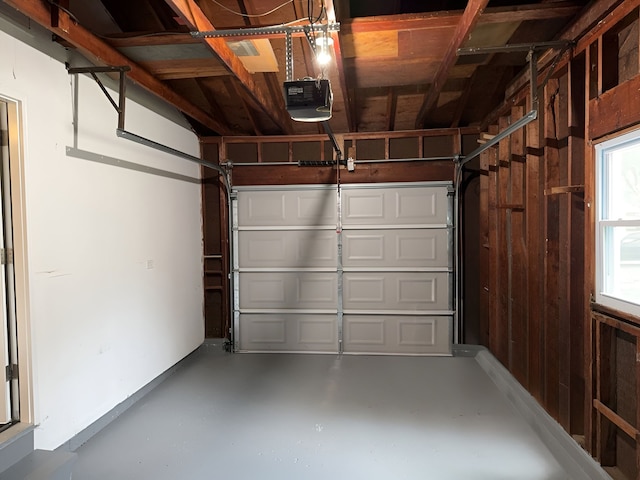 garage featuring a garage door opener