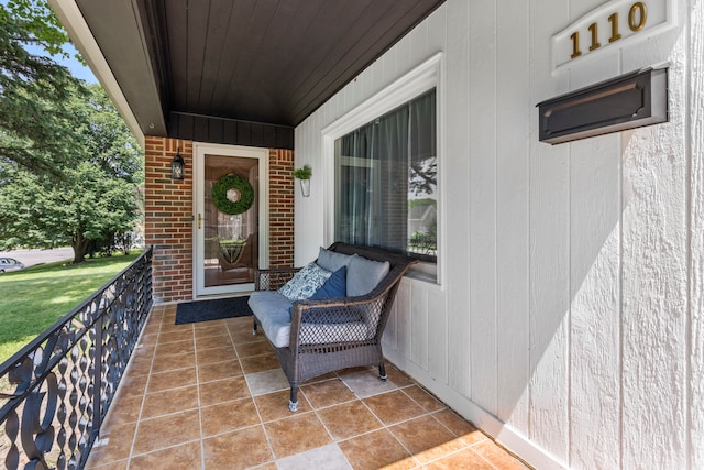 view of patio featuring a porch