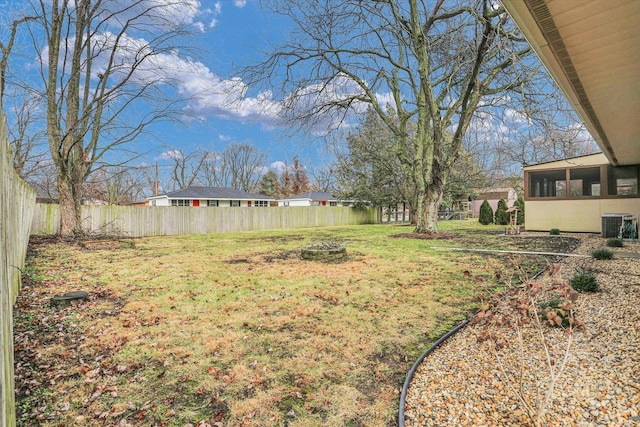 view of yard with central AC unit