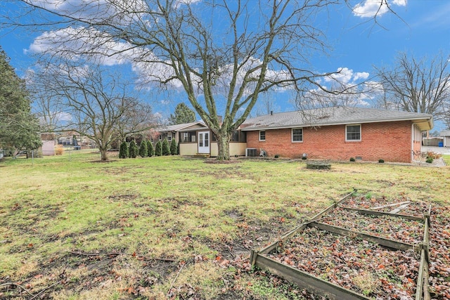 view of yard featuring central AC