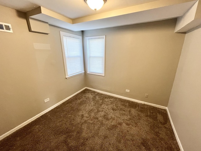 empty room with carpet flooring