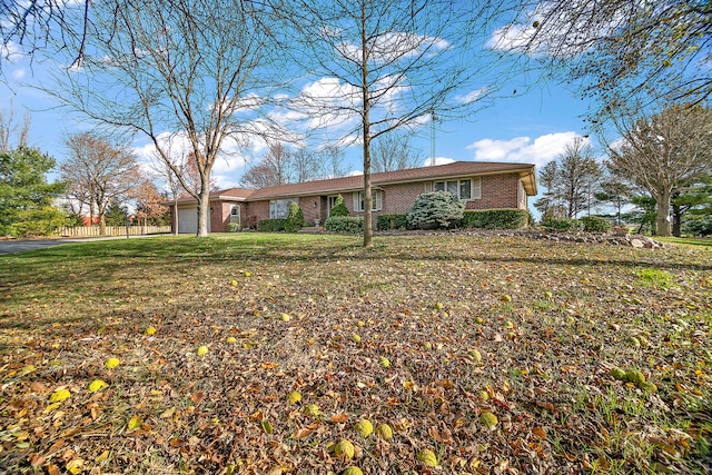 ranch-style house featuring a front lawn