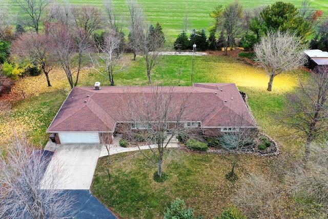 birds eye view of property featuring a rural view