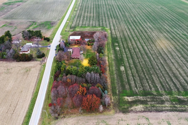 birds eye view of property featuring a rural view