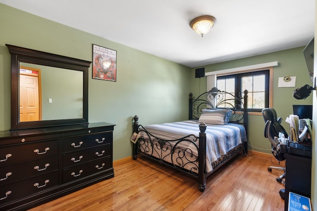 bedroom with light hardwood / wood-style floors