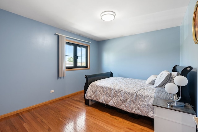 bedroom featuring light hardwood / wood-style floors