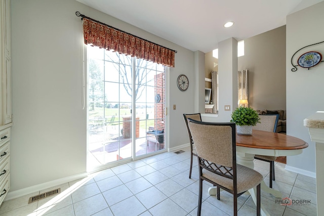 dining room with light tile patterned floors