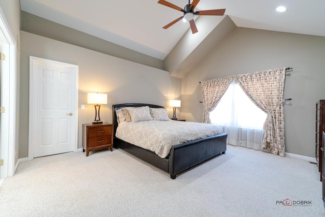 bedroom with ceiling fan, light colored carpet, and high vaulted ceiling