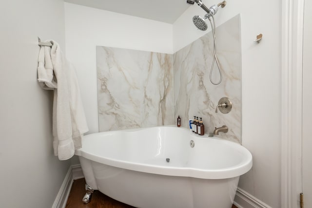 bathroom featuring a washtub