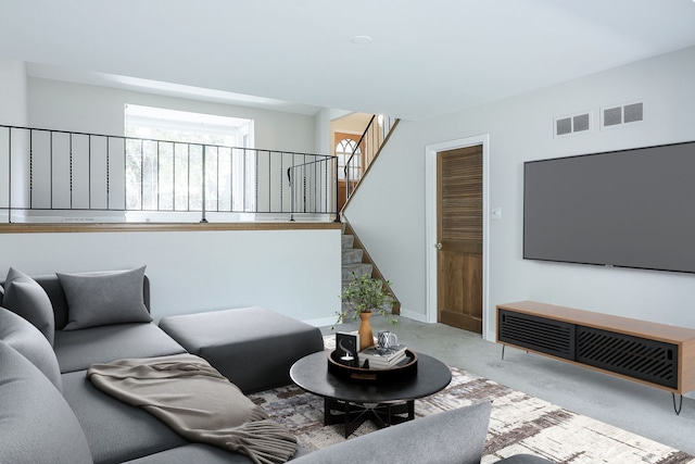 living room with light colored carpet