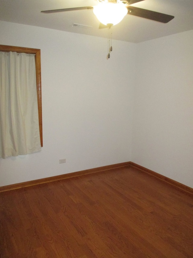 unfurnished room featuring hardwood / wood-style flooring