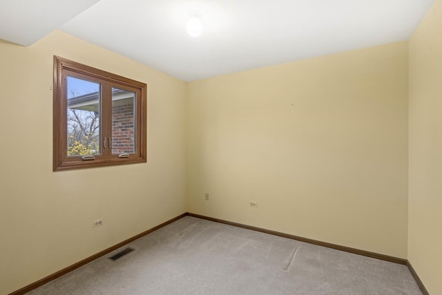 view of carpeted spare room