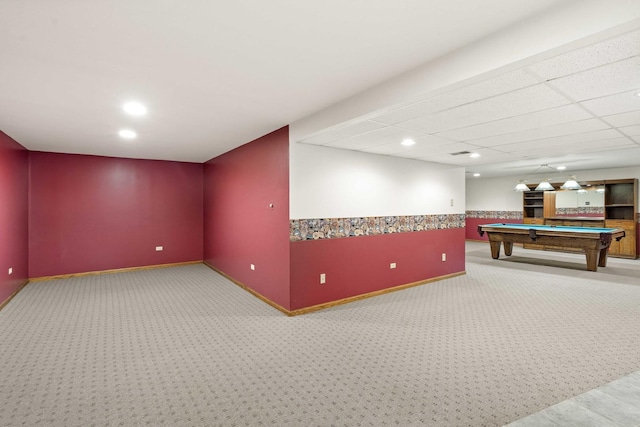 interior space featuring a drop ceiling, carpet floors, and billiards