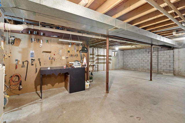 basement with a workshop area