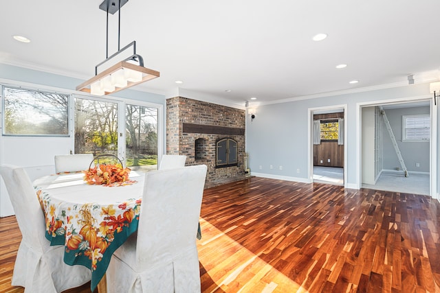 unfurnished dining area with crown molding and hardwood / wood-style floors