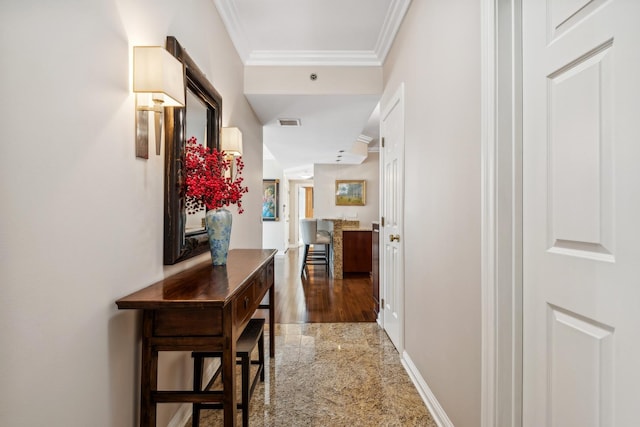 corridor featuring ornamental molding