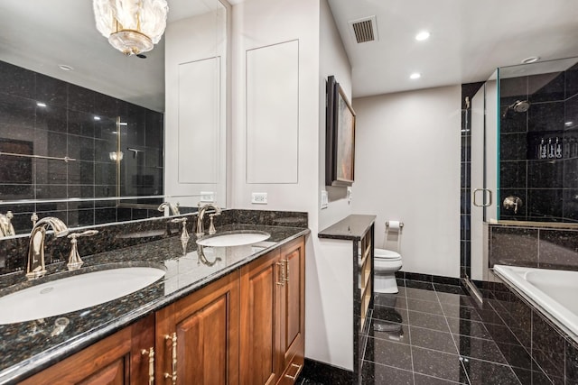 full bathroom featuring toilet, vanity, and shower with separate bathtub