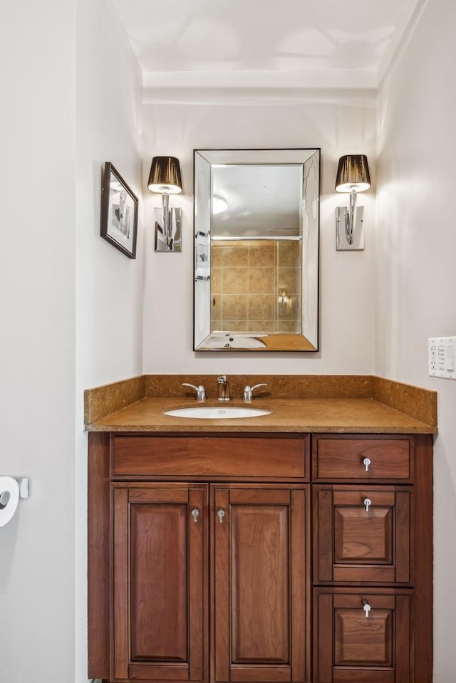 bathroom featuring vanity and walk in shower