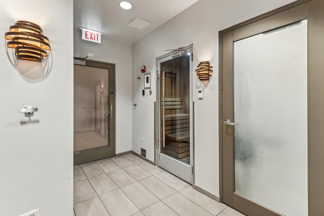 bathroom with tile patterned floors