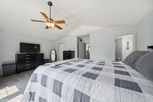 carpeted bedroom featuring ceiling fan and vaulted ceiling