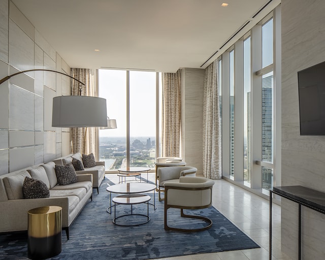 tiled living room with expansive windows