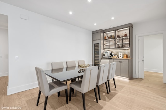 dining space featuring light hardwood / wood-style floors