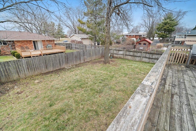 view of yard featuring a wooden deck