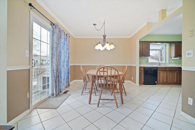 tiled dining area with crown molding and a chandelier