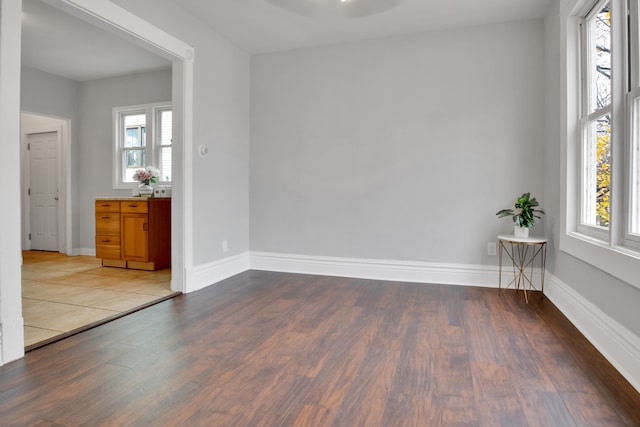 unfurnished room featuring light wood-type flooring