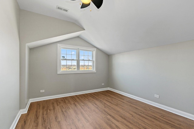 bonus room with ceiling fan, wood-type flooring, and lofted ceiling