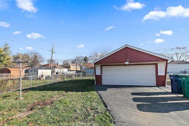 garage with a lawn